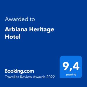 a blue sign with the text awarded to african heritage hotel at Arbiana Heritage Hotel in Rab