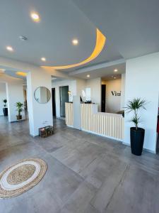 an empty lobby with a vitt lobby at Hotel VIU57 in Mellieħa +37 photos
