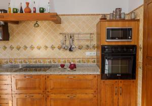 Kuchyňa alebo kuchynka v ubytovaní Cubo's Finca Los Magnolios