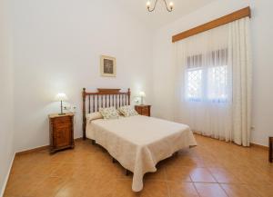 Posteľ alebo postele v izbe v ubytovaní Cubo's Finca Los Magnolios