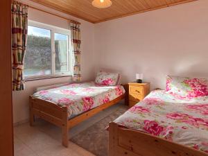 Voodi või voodid majutusasutuse Cottage 396 - Roundstone toas