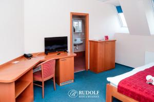 TV a/nebo společenská místnost v ubytování Hotel Rudolf