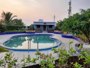 Swimmingpoolen hos eller tæt på Windsongs A Premium Seaview Tropical Village