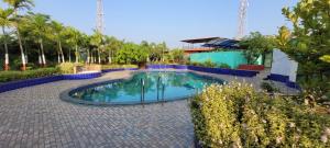 Swimmingpoolen hos eller tæt på Windsongs A Premium Seaview Tropical Village