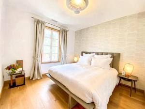 Petit Monlot - Saint-Emilion客房内的一张或多张床位
