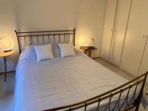 Een bed of bedden in een kamer bij Vakantiehuisje Makkum NL - T11