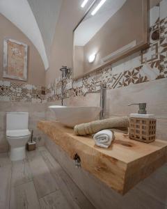 Koupelna v ubytování Apartamentos Gladiador + 37 fotografií