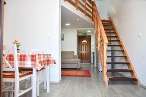 Postel nebo postele na pokoji v ubytování Föveny Apartmanok