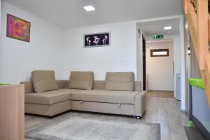 Posezení v ubytování Föveny Apartmanok