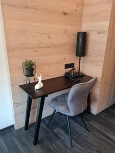 TV a/nebo společenská místnost v ubytování Hotel Koch