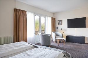 TV a/nebo společenská místnost v ubytování Montra Hotel Hanstholm