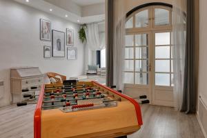 a room with a foosball table in front of it at NOCNOC - Le Renversant in Marseille