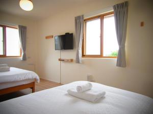 Letto o letti in una camera di Mulight B&B