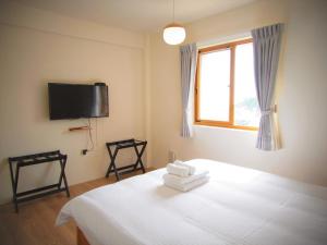 Letto o letti in una camera di Mulight B&B