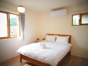 Letto o letti in una camera di Mulight B&B
