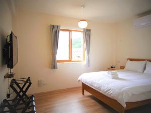Letto o letti in una camera di Mulight B&B