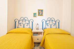 Posteľ alebo postele v izbe v ubytovaní TaoApartments - Casa Salina