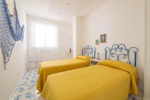 Posteľ alebo postele v izbe v ubytovaní TaoApartments - Casa Salina