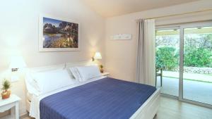 Postel nebo postele na pokoji v ubytování Hotel Nibaru + 37 fotografií