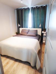 Posteľ alebo postele v izbe v ubytovaní Plac Grzybowski Apartment