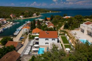 an aerial view of a harbor with boats at Villa Median in Žman