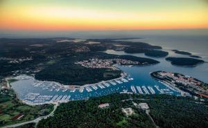 an aerial view of a harbor at sunset at Apartman Diana,free parking in Pula