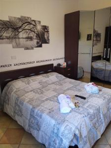 Säng eller sängar i ett rum på Fercla appartamento