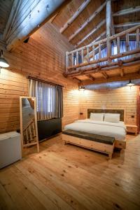 Postel nebo postele na pokoji v ubytování Pino Mar Luxury Bungalows