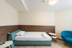 Postel nebo postele na pokoji v ubytování Hotel Terrace