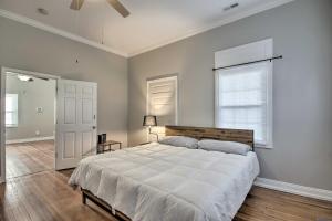 a bedroom with a large bed and a window at Columbia Home with Spacious Yard Less Than 2 Mi to Dtwn in Columbia