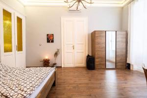 Posteľ alebo postele v izbe v ubytovaní V6 Apartment by Small Home Budapest
