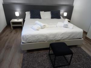 Postel nebo postele na pokoji v ubytování Residenza Novi