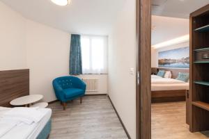 Postel nebo postele na pokoji v ubytování Hotel Terrace