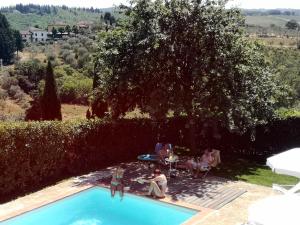 The swimming pool at or close to La Compagnia del Chianti