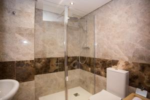 A bathroom at Manilva Townhouse with spectacular views of Gibraltar