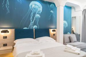Postel nebo postele na pokoji v ubytování Carizza Rooms