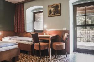 Postel nebo postele na pokoji v ubytování Chata Trojkámen