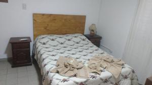 Кровать или кровати в номере Abuela Chiquita