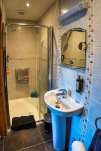 Ванная комната в 21 Killarney Holiday Village