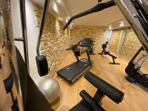 an overhead view of a gym with cardio equipment at Janas Country Resort in Mores