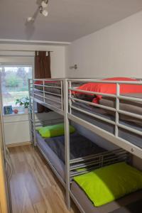 a couple of bunk beds in a room at Ferienanlage Inselzauber in Gustow