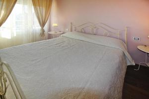 Posteľ alebo postele v izbe v ubytovaní Villa with above ground pool in Camaiore