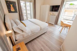 TV a/nebo společenská místnost v ubytování Design 18 Charming Rooms