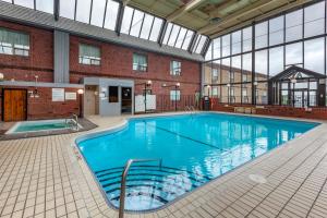 a large swimming pool in a building at Quality Inn & Conference Centre Midland in Midland