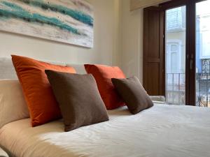 A bed or beds in a room at Gav Espinel Ronda Centro
