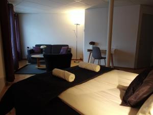 Postel nebo postele na pokoji v ubytování Arctic Inn + 13 fotografií