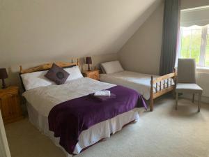 Voodi või voodid majutusasutuse The Curragh Country House Accommodation toas