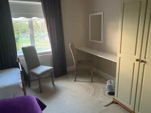 Istumisnurk majutusasutuses The Curragh Country House Accommodation