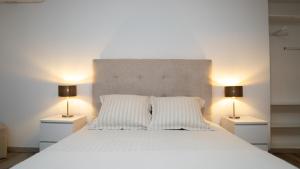 Letto o letti in una camera di Solar Quinta da Portela - Douro Altre 42 foto