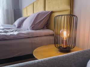 Posteľ alebo postele v izbe v ubytovaní Krosna Street Apartament